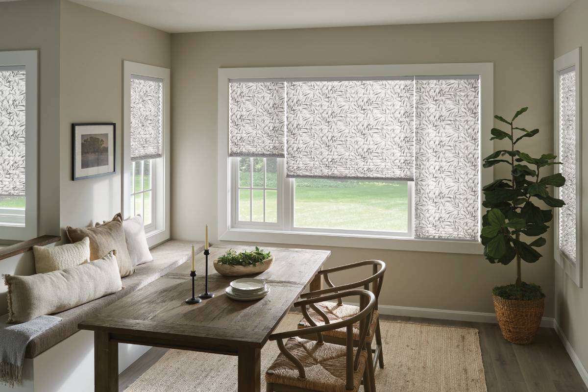 Graber® Pleated Shades in a fabulous fabric in a stylish dining room area of a home