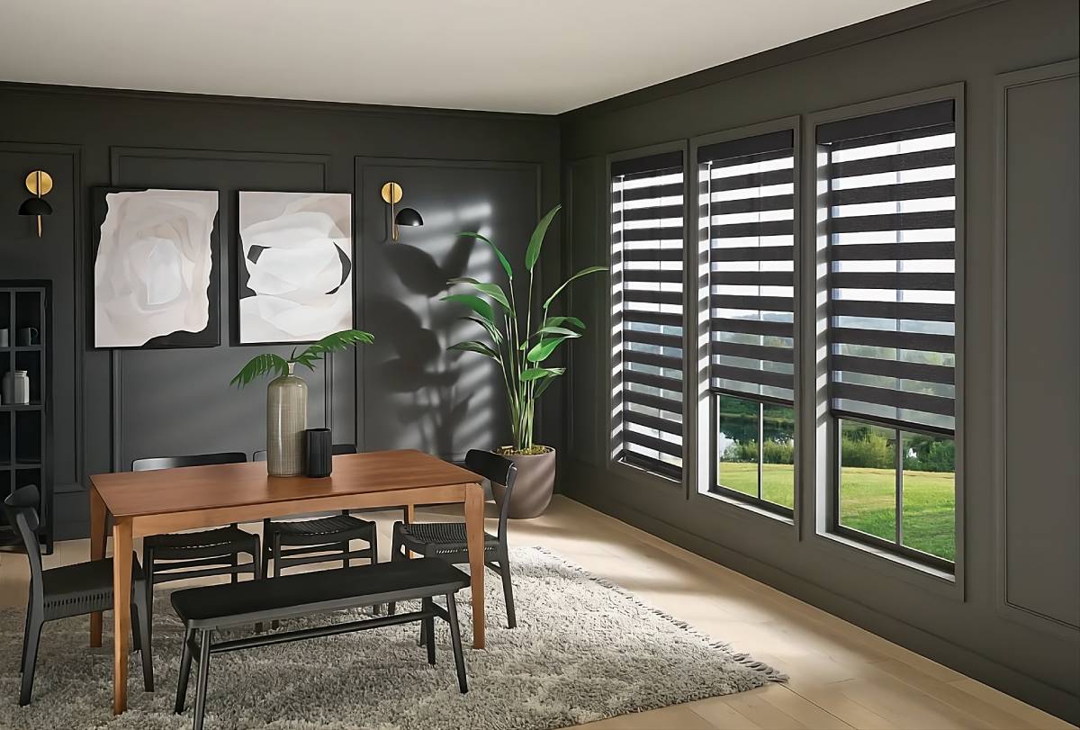 Graber® Layered Shades, or zebra shades, in a moody dining room in a residential home near Dayton, OH